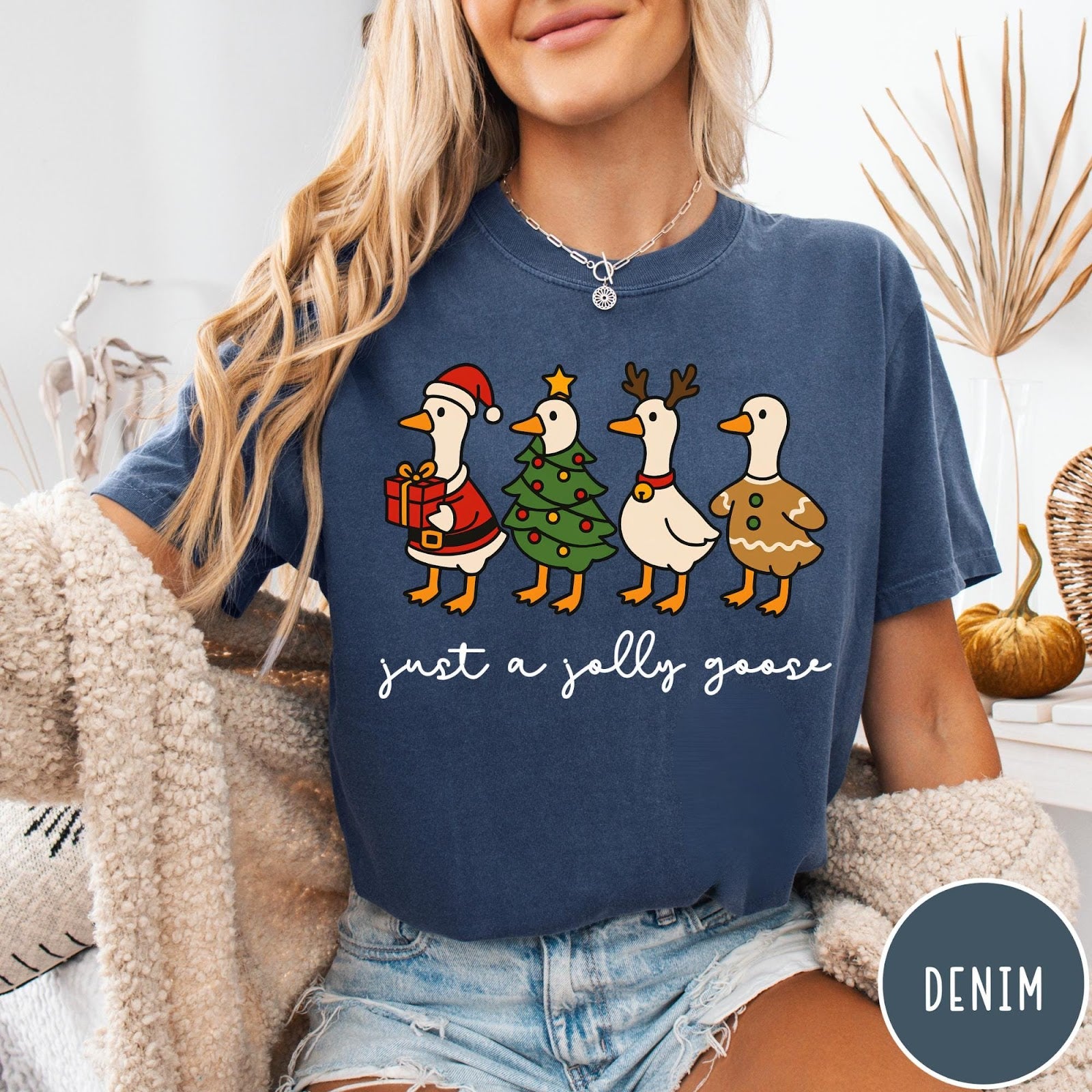Comfort Colors tee in Denim featuring festive geese graphic with Santa, Christmas tree, reindeer, and gingerbread goose designs