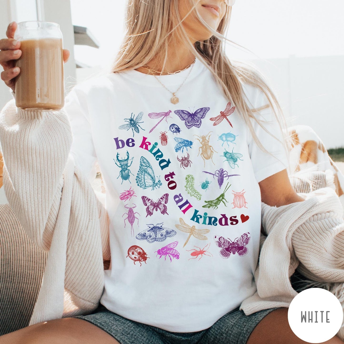 Comfort Colors tee in White featuring insect and butterfly graphic with text be kind to all kinds