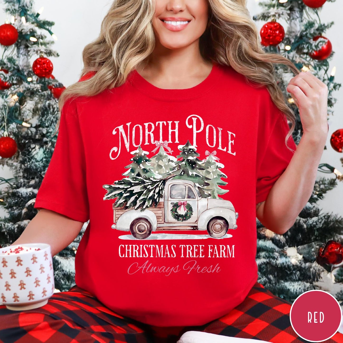 Comfort Colors tee in Red featuring vintage style Christmas tree farm truck graphic with snowy pine trees