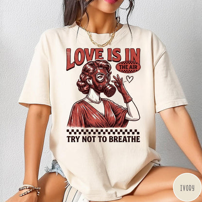 Comfort Colors tee in Ivory featuring retro style graphic of a woman wearing a gas mask