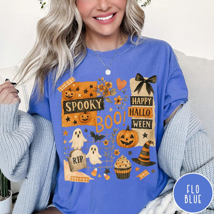 Comfort Colors tee in Flo Blue featuring Halloween collage design with pumpkins, ghosts, and festive autumn graphics