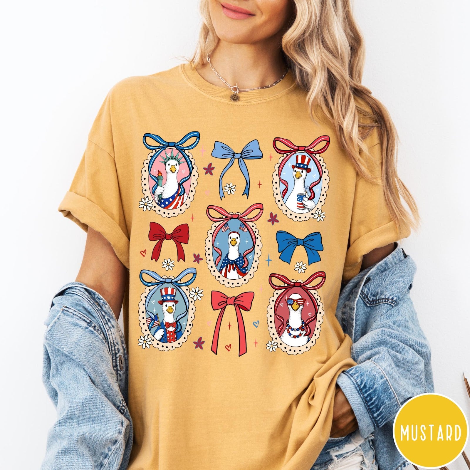 Comfort Colors tee in Mustard featuring coquette style patriotic goose graphic with bows and floral accents