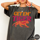 Comfort Colors tee in Pepper featuring vintage style graphic with orange text and a walking tiger illustration