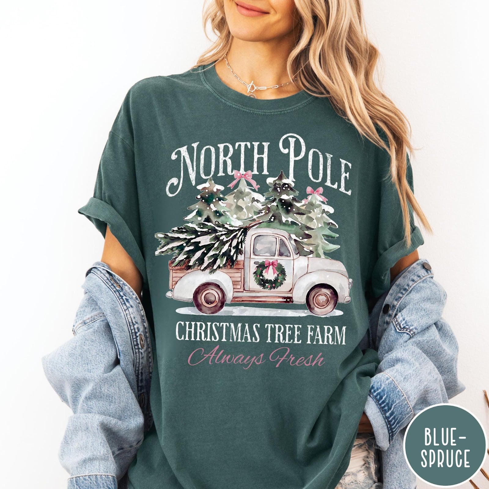 Comfort Colors tee in Blue Spruce featuring vintage style Christmas tree farm truck graphic with snowy pine trees