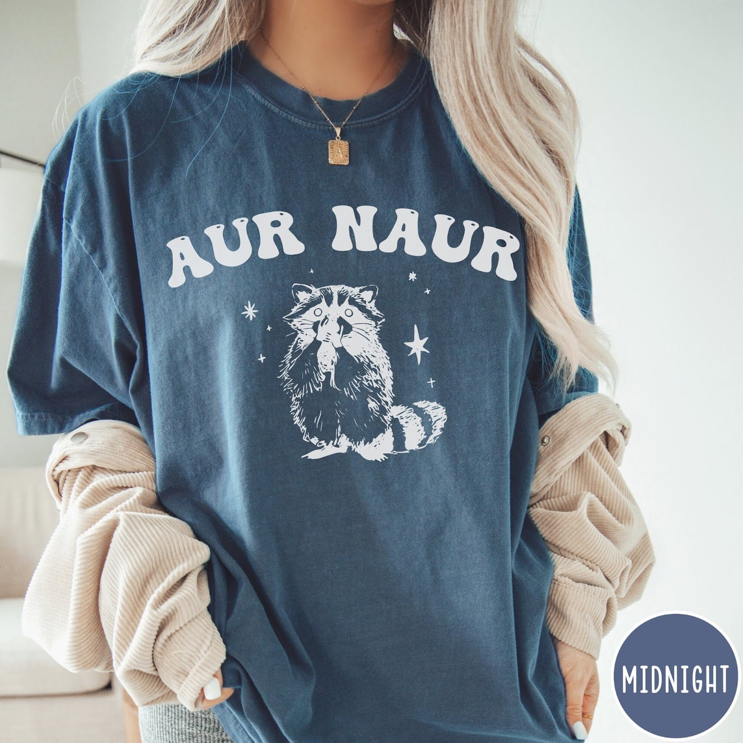 Comfort Colors tee in Midnight featuring retro style graphic of a raccoon with stars and text