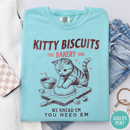 Comfort Colors tee in Chalky Mint featuring vintage style graphic of a cute cat kneading dough for biscuits