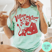 Comfort Colors tee in Island Reef featuring vintage style graphic of a devilish couple embracing with red ink