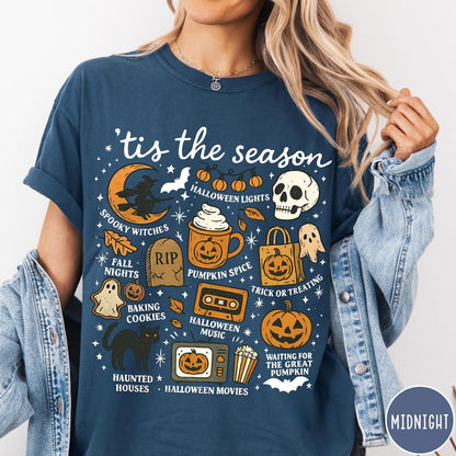 Comfort Colors tee in Midnight featuring Halloween icons collage with witch, skull, pumpkin, and spooky fall graphics