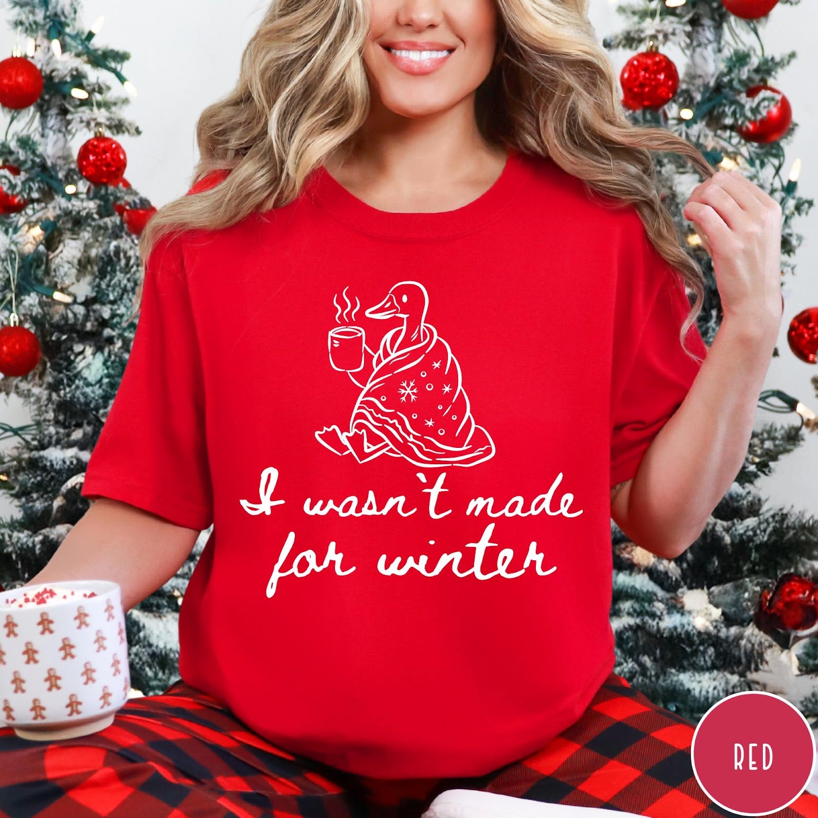 Comfort Colors tee in Red featuring line art graphic of a duck wrapped in a blanket drinking coffee