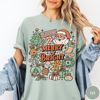 Comfort Colors tee in Bay featuring retro holiday style graphic with Santa, reindeer, and Christmas icons