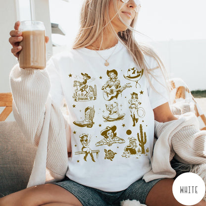 Comfort Colors tee in White featuring retro western collage graphic with cowgirls, boots, and desert elements