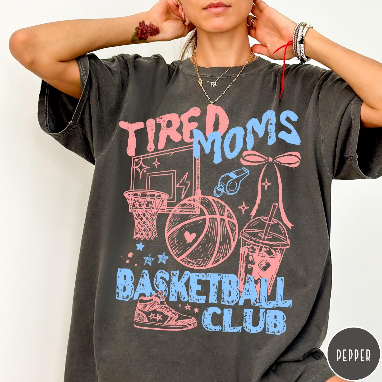 Comfort Colors tee in Pepper featuring basketball mom life graphic with basketball, hoop, whistle, and drink illustration