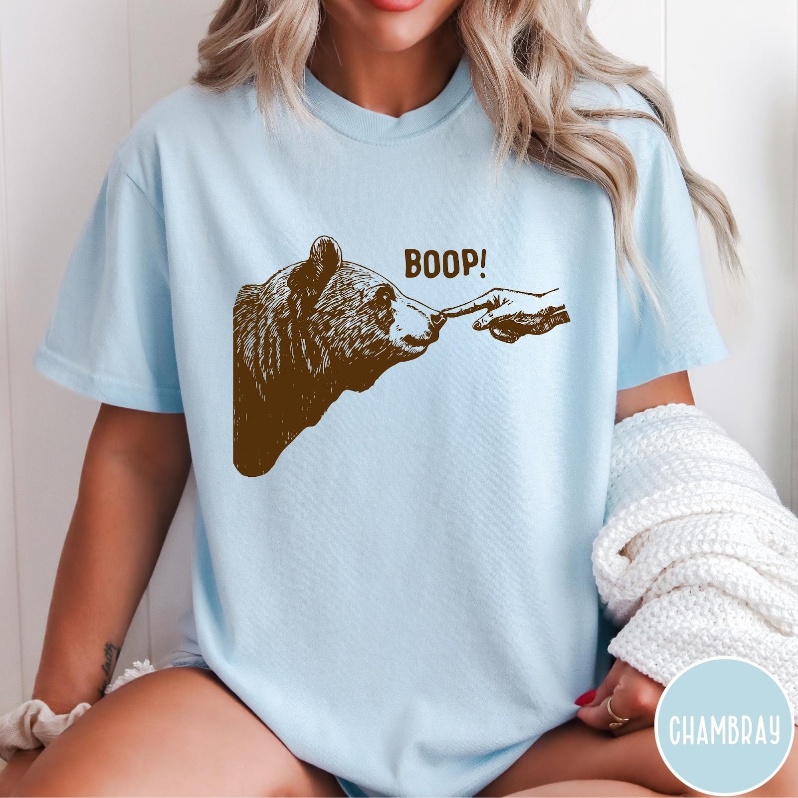Comfort Colors tee in Chambray featuring a brown ink graphic of a human finger booping a bear nose