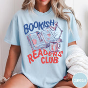 Comfort Colors tee in Chambray featuring illustrated book graphic with a lamp and a coffee mug design