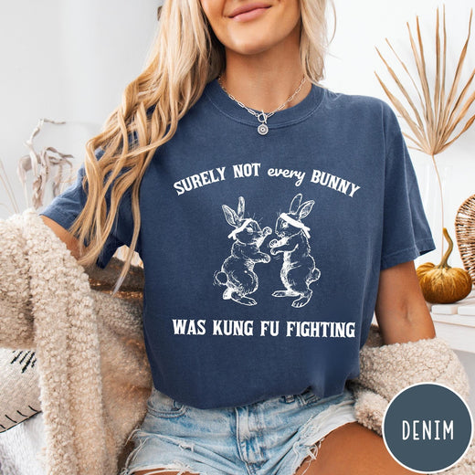 Comfort Colors tee in Denim featuring vintage style graphic of two rabbits wearing headbands kung fu fighting