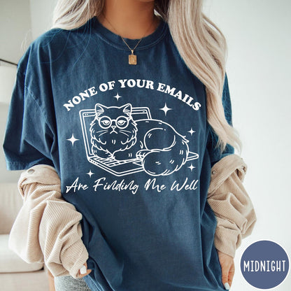 Comfort Colors tee in Midnight featuring line art graphic of a grumpy cat wearing glasses on a laptop