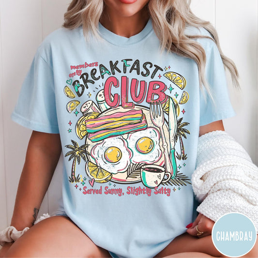 Comfort Colors tee in Chambray featuring breakfast food graphic with bacon, eggs, coffee, and palm trees.