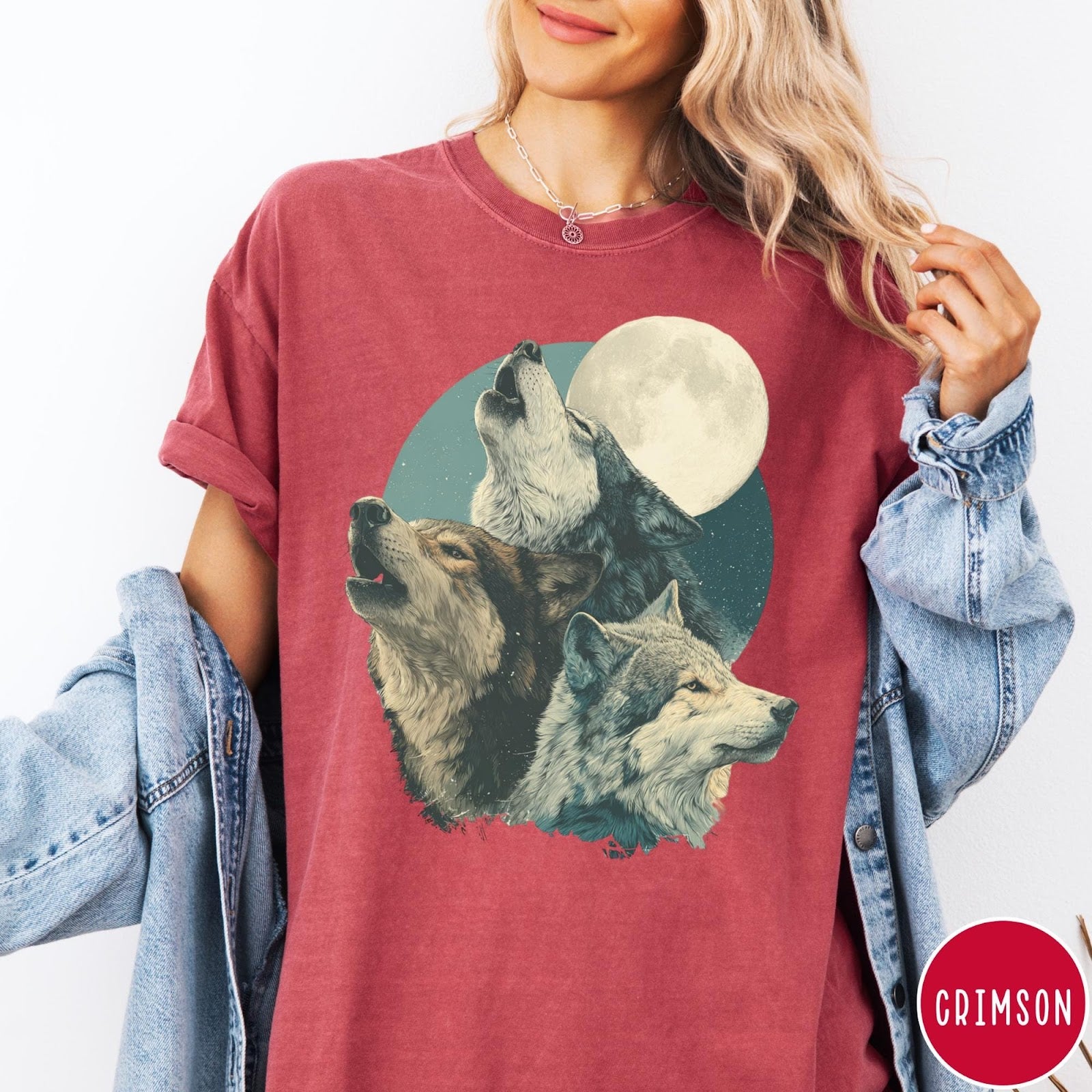 Comfort Colors tee in Crimson featuring vintage style graphic of three wolves howling at a full moon