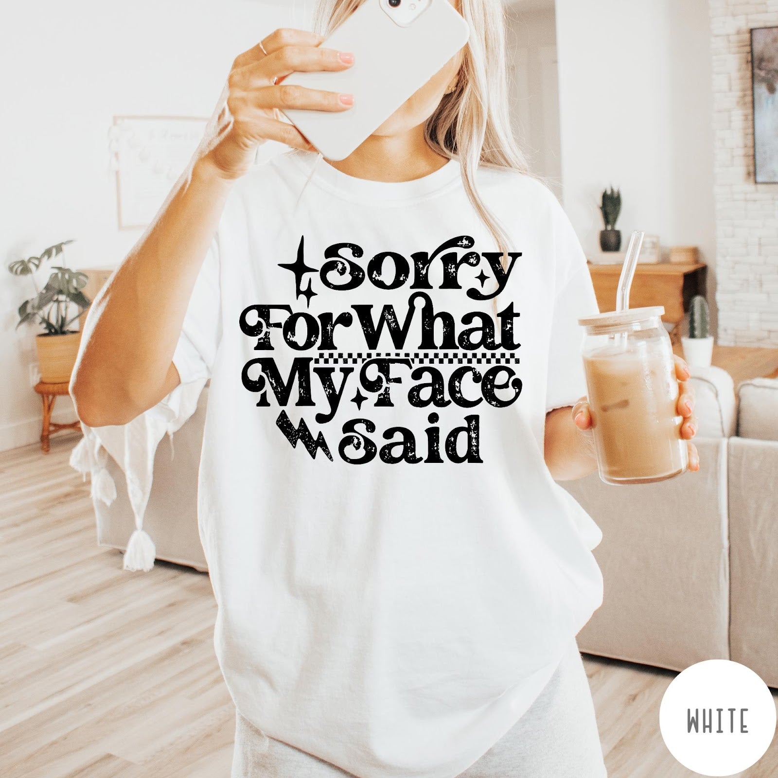 Comfort Colors tee in White featuring sarcastic expression graphic Sorry for What My Face Said in black