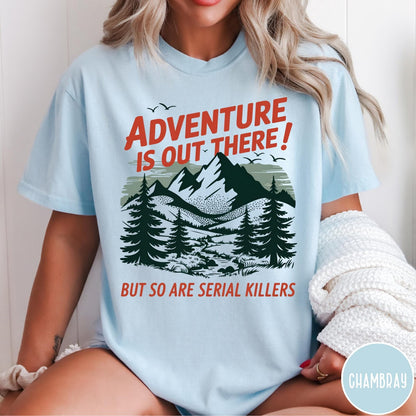 Comfort Colors tee in Chambray featuring mountain and tree graphic with adventure and serial killer text design