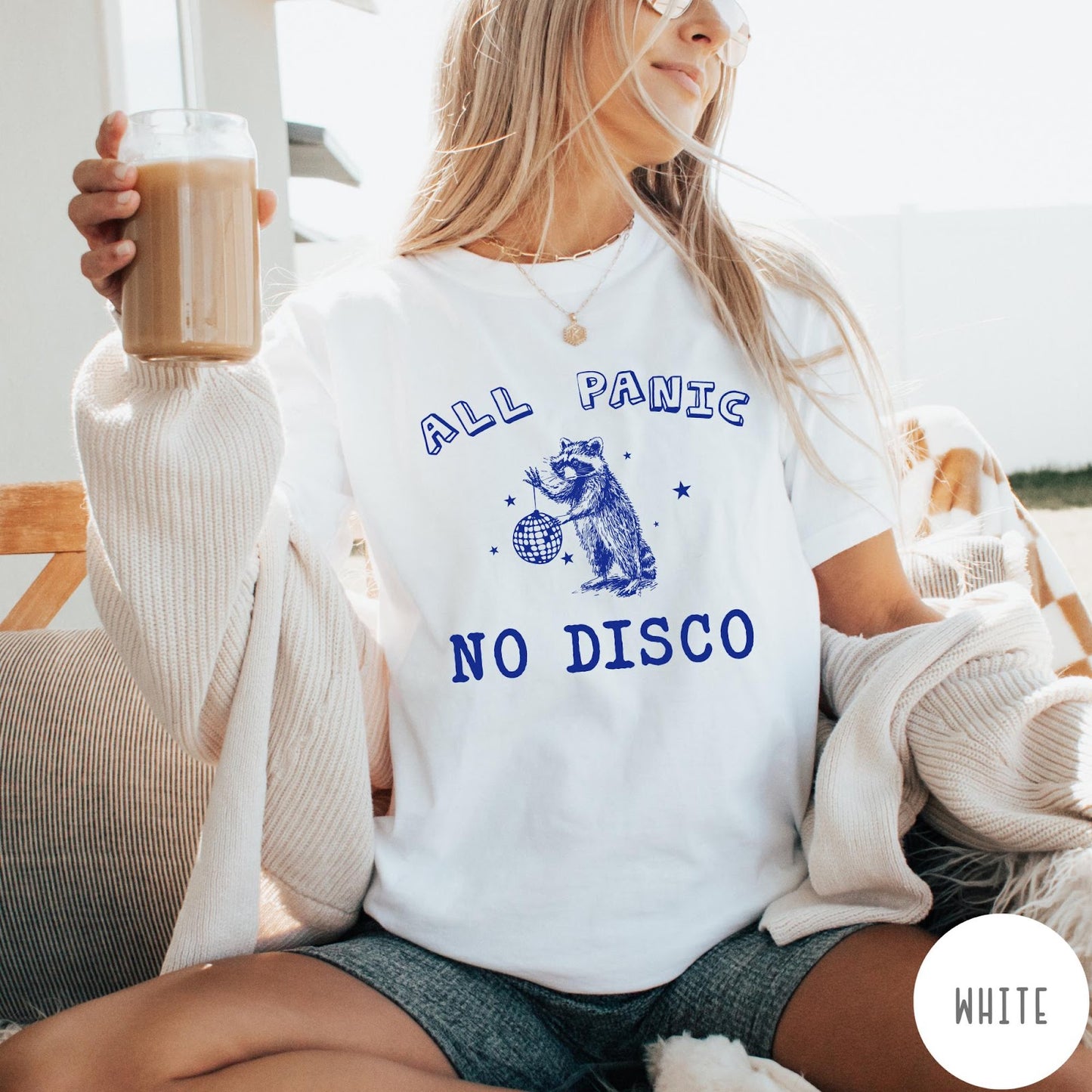 Comfort Colors tee in White featuring screen printed raccoon graphic holding a disco ball with star accents