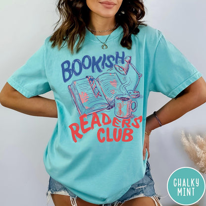 Comfort Colors tee in Chalky Mint featuring bookish reading graphic with open book, lamp, and coffee mug