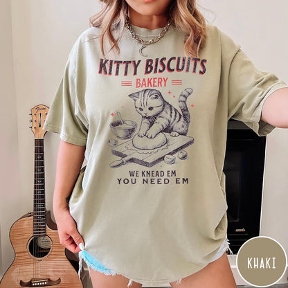 Comfort Colors tee in Khaki featuring vintage style graphic of a cat baking biscuits on board