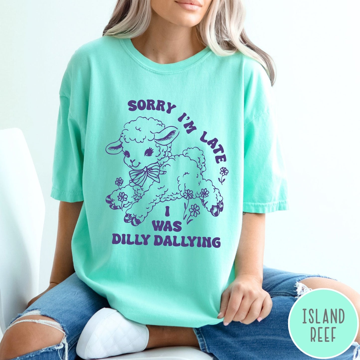 Comfort Colors tee in Island Reef featuring line art graphic of a lamb with flowers and text