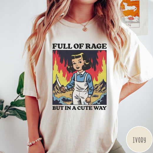 Comfort Colors tee in Ivory featuring cartoon style graphic of a girl holding a knife in flames