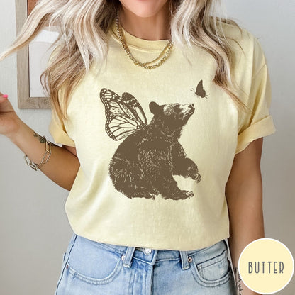 Comfort Colors tee in Butter featuring vintage style graphic of a bear with butterfly wings and butterfly