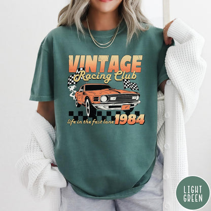 Comfort Colors tee in Light Green featuring vintage muscle car graphic with racing flags and 1984 text