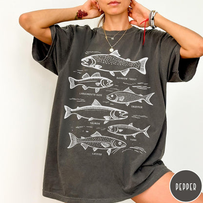 Comfort Colors tee in Pepper featuring vintage line illustration of various fish species with their names labeled.