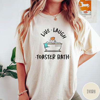 Comfort Colors tee in Ivory featuring cute graphic style of a smiling toaster sitting in a bathtub
