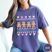 Comfort Colors tee in Grape featuring vintage teddy bear pattern with hearts and pink bow tie bears