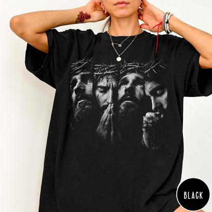 Comfort Colors tee in black featuring a graphic of Jesus with a crown of thorns praying