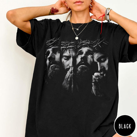 Comfort Colors tee in black featuring a graphic of Jesus with a crown of thorns praying