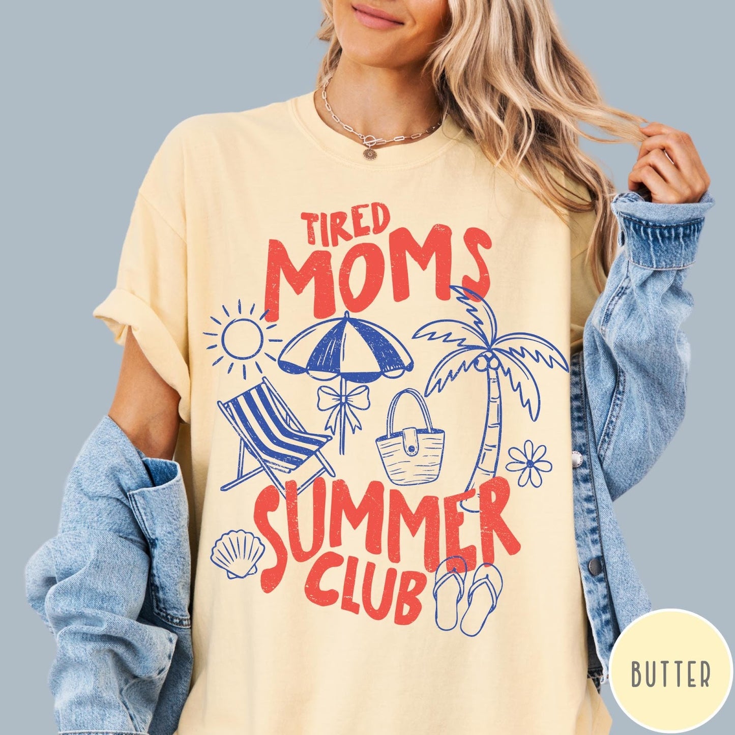 Comfort Colors tee in Butter featuring beach vacation style graphic with sun, umbrella, palm tree, and bag