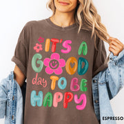 Comfort Colors tee in Espresso featuring typography and floral elements with a smiley face graphic design
