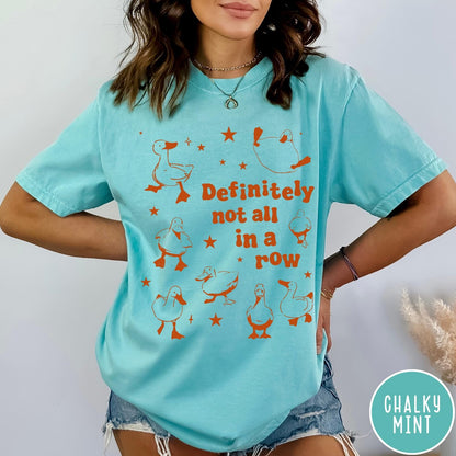 Comfort Colors tee in Chalky Mint featuring whimsical duck design with scattered stars and text about ducks.