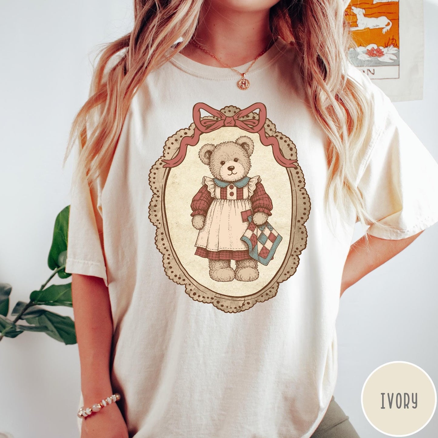 Comfort Colors tee in Ivory featuring vintage style teddy bear graphic inside a decorative lace oval frame