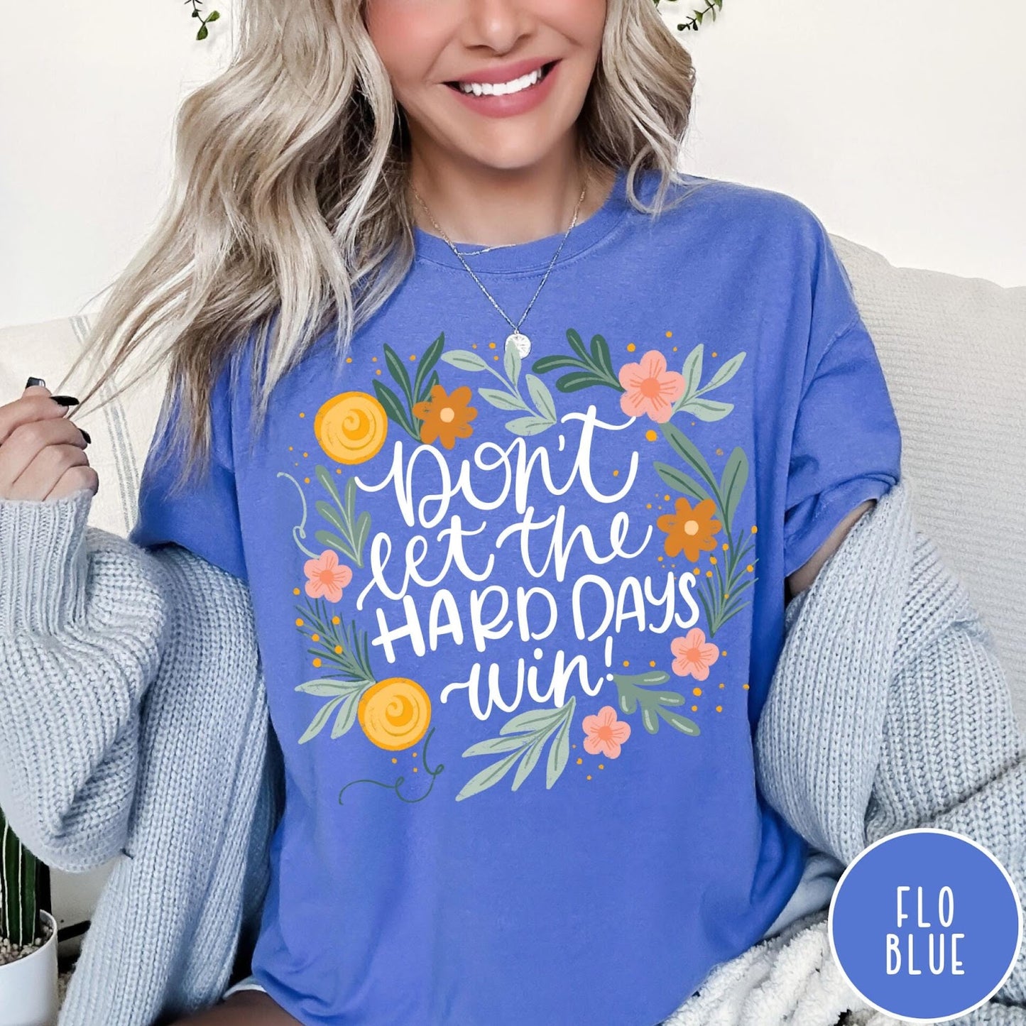 Comfort Colors tee in Flo Blue featuring floral design with mental health encouragement text Don't Let The Hard Days Win