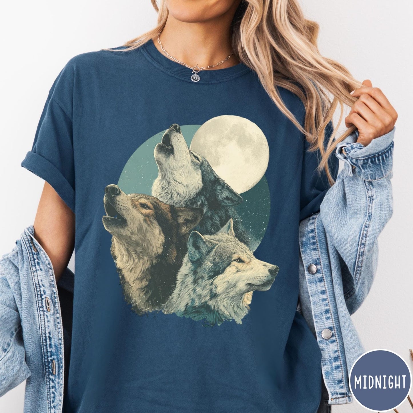 Comfort Colors tee in Midnight featuring vintage style graphic of three wolves howling at a full moon