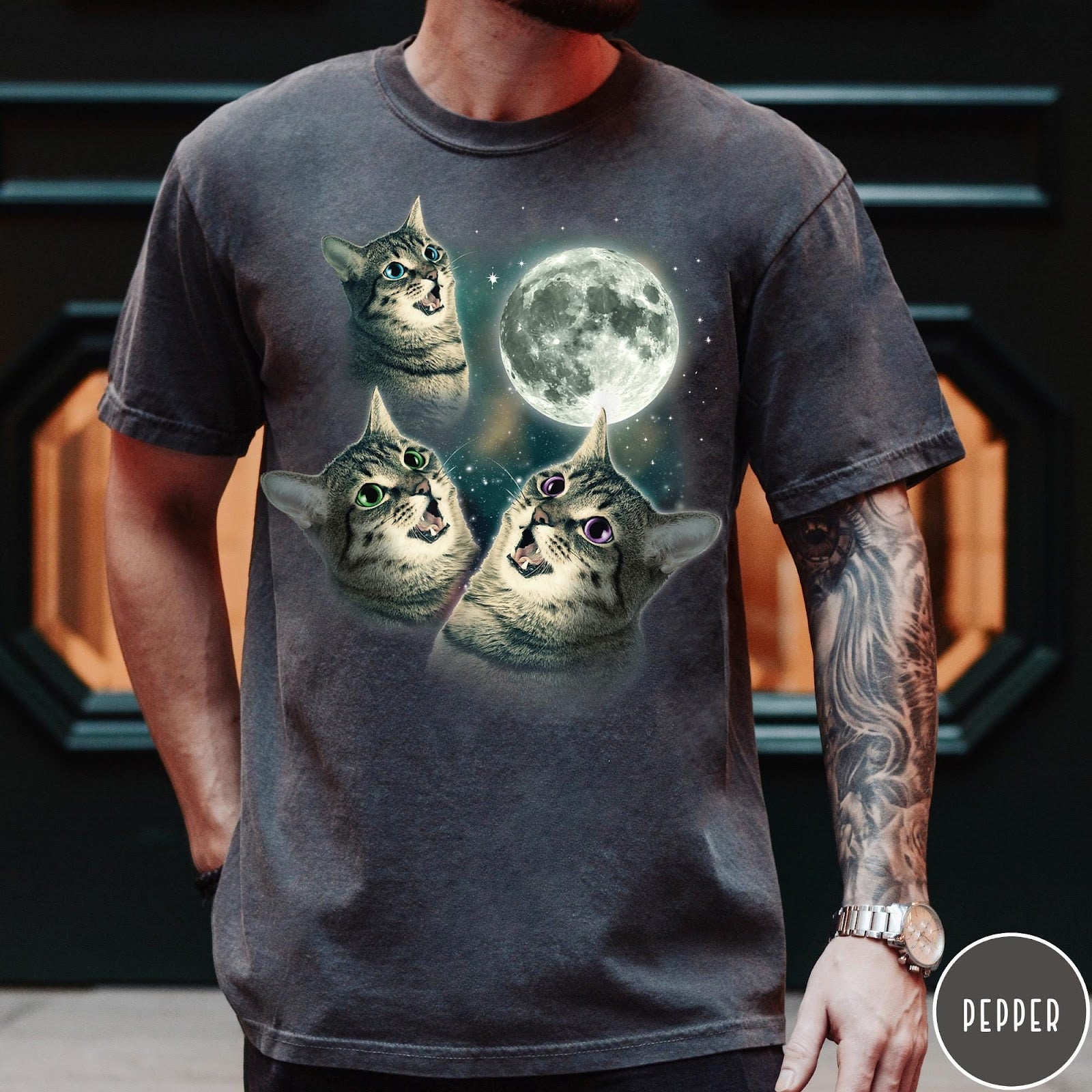 Comfort Colors tee in Pepper featuring retro style graphic of three cats looking up at the moon