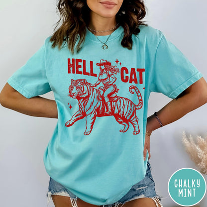 Comfort Colors tee in Chalky Mint featuring western style graphic of a cowgirl riding a tiger
