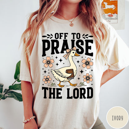 Comfort Colors tee in Ivory featuring screen print style graphic of a goose carrying a book