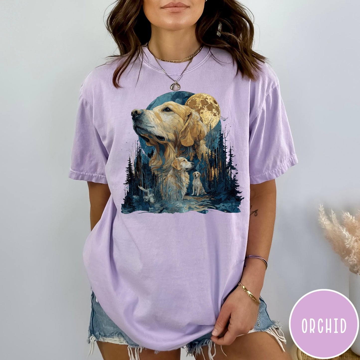 Comfort Colors tee in Orchid featuring artistic graphic design of Golden Retrievers in a moonlit forest scene