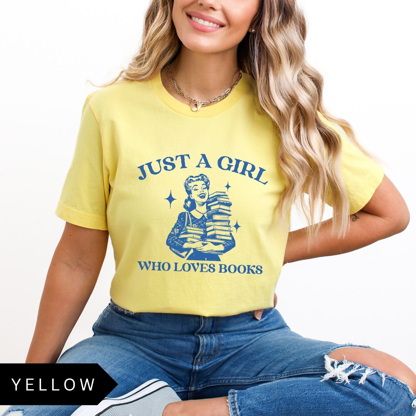 Comfort Colors tee in Yellow featuring vintage style graphic of a girl holding a stack of books