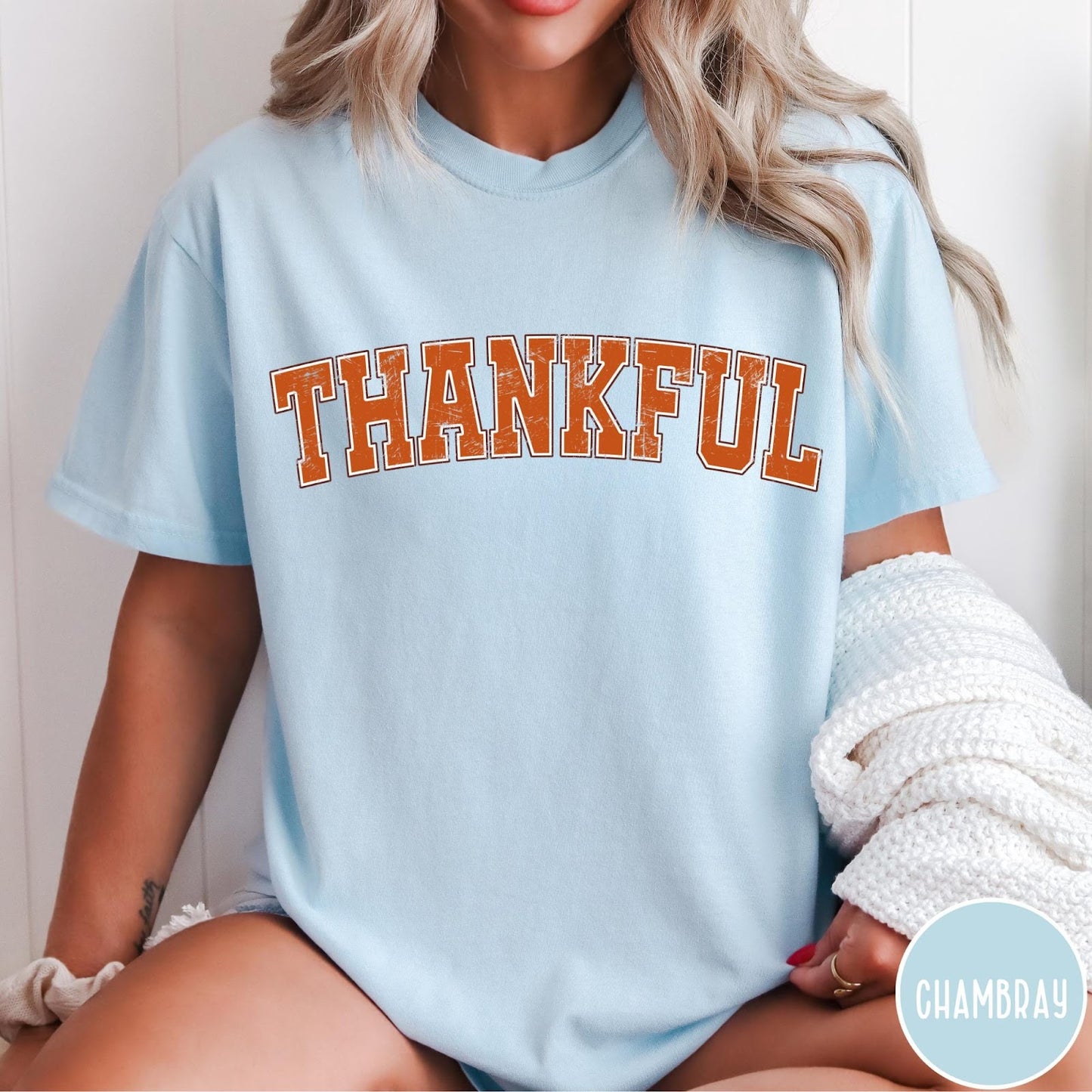 Comfort Colors tee in Chambray featuring typography graphic with the word Thankful in an arched varsity style