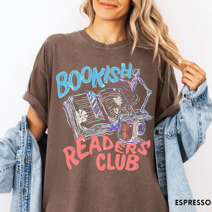 Comfort Colors tee in Espresso featuring illustrated book graphic with a lamp and a coffee mug design