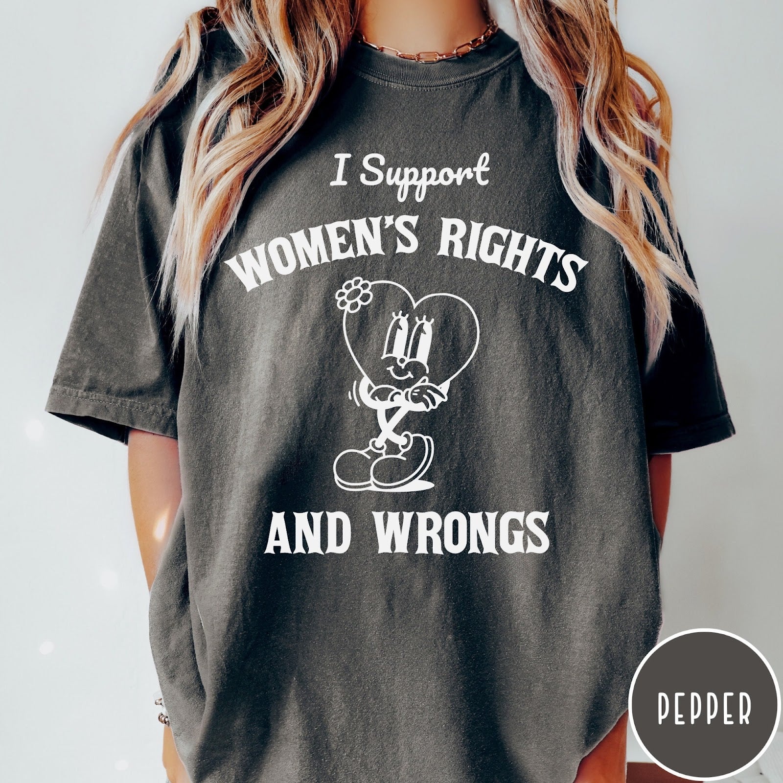 Comfort Colors tee in Pepper featuring retro style heart mascot graphic with women's rights text